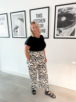 Squiggle print trousers white